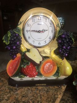 Fruit fountain and clock