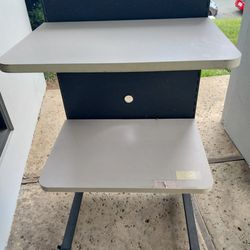 Nice strong desk with Wheels  good condition.