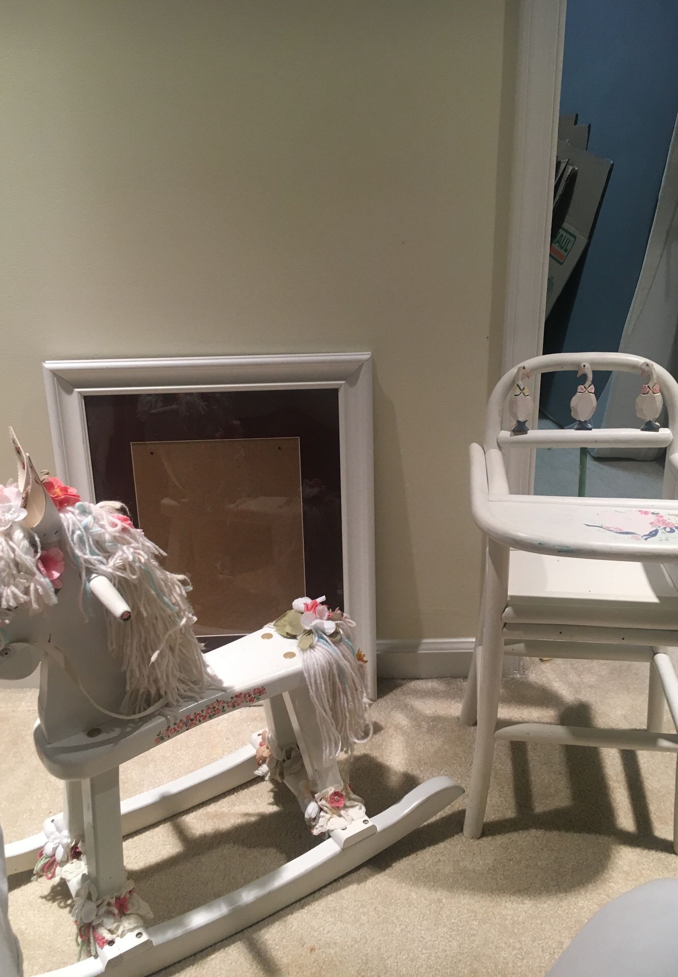 Rocking horse and white frame