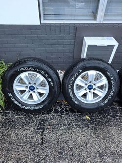 Used Tires and Rims 265/70R17 from a 2015 Ford F-150 xlt