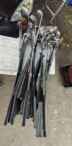 A Bunch Of Golf Clubs