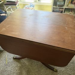 Duncan Phyfe Style Drop-Leaf Dining Table with Three Central Leafs, Brass Claw Feet and Five Chairs