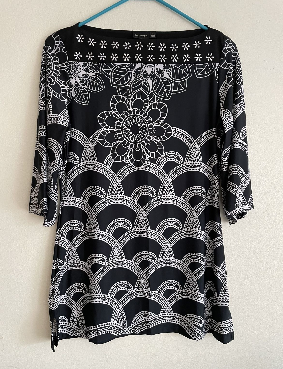 A women's mid-length top (or dress top) designed by the Lavanya brand. • Print style: It features highly recognizable black and white geometric and fl