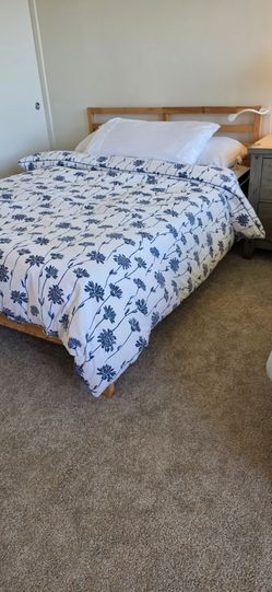 Queen-size bed and mattress