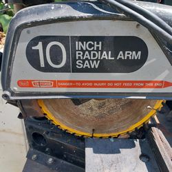 10 inches. Radial  Arm Saw With bench table   excellent condition.