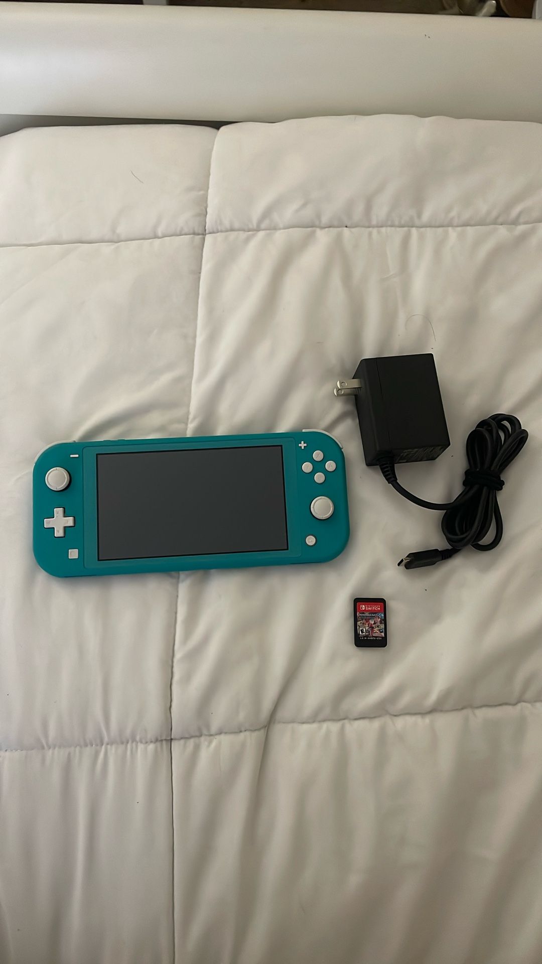 Nintendo Switch Light (Blue) includes Mariokart Deluxe 8...