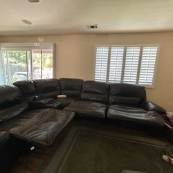 10 x 11 Ft Brown Leather Sofa w (4) Recliners And Storage 