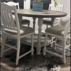 Dining Table with chairs set of 4 Ashley Furniture Havalance round counter table with 4 chairs (upholstered seats) 