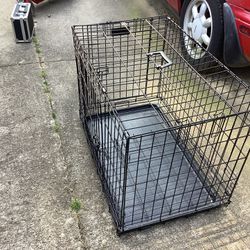 Dog crate two Door With Divider ( Fold Up For Easy Storage ). $35/