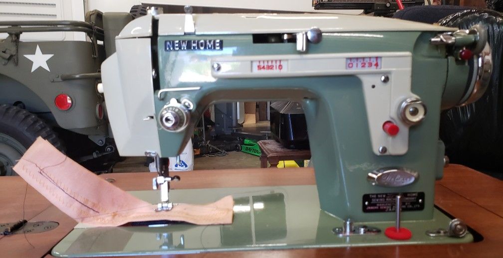 Vintage 1960's New Home Deluxe Sewing Machine With Table . Please Call (contact info removed)