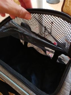 A puppy sized Travel Bag for small sized dogs
