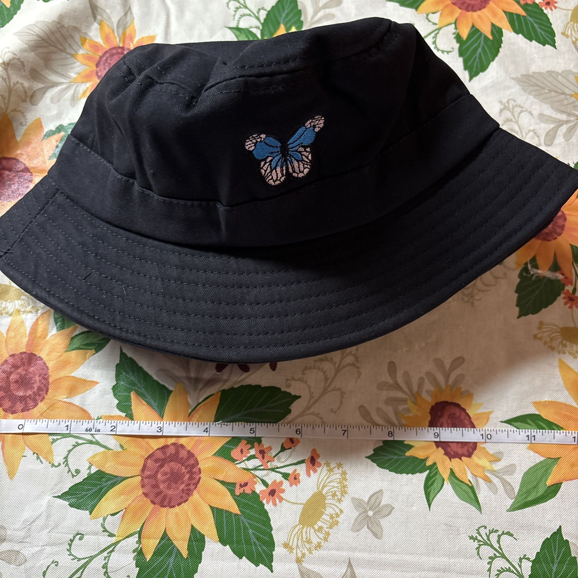 Black bucket hat with butterfly design #streetwear #summeraccessories