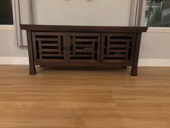 Dark Wood TV Stand with Lattice Doors