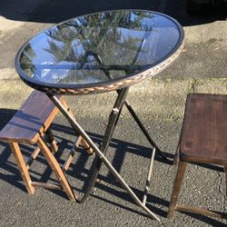 Brown Round Glass Table With Two Stools
