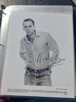 V.a signed photo as well as photo