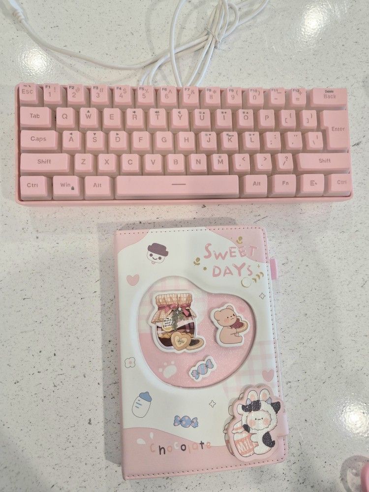 Pink Keyboard And Notebook