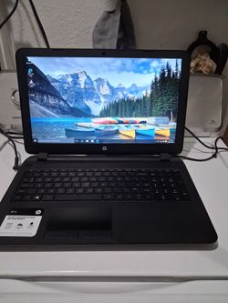 Hp  slim  laptop computer windows 10.  Battery doesn't charge,  but it works good plugged.   15'6 inches.  AMD E1  210 APU processor.   with Radeon Gr