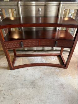 Console table, bowed.