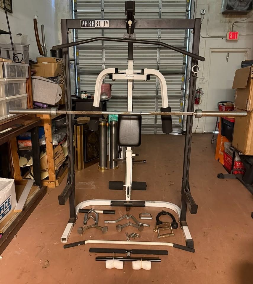 Pro System 893 Home Workout Gym Machine w/ Bench, (2) Barbells, Weight Plates + Rack, & Accessories