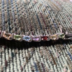 925 HNA stamp, silver, and colored stone bracelet
