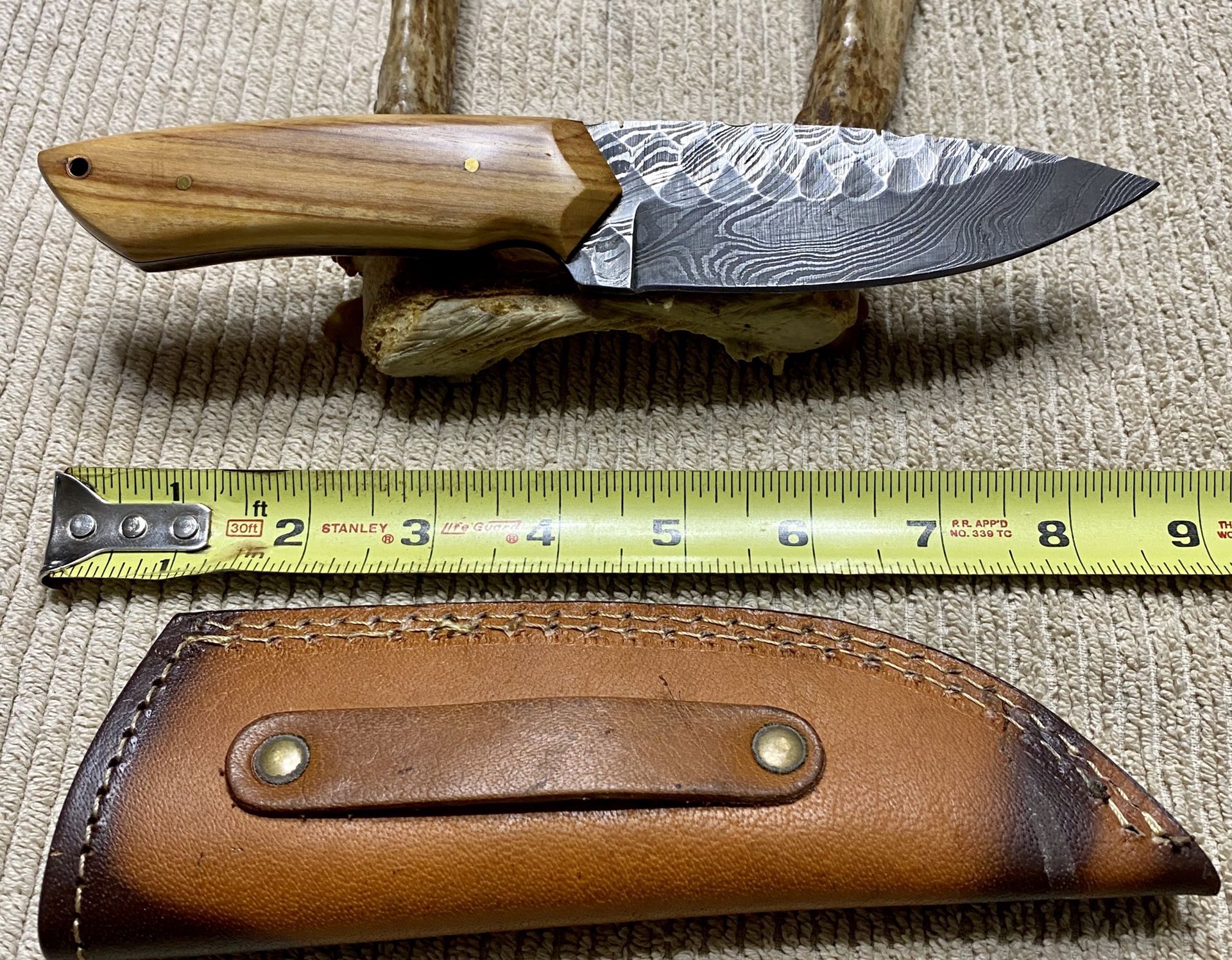 New Damascus steel blade with custom leather sheath