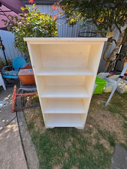 Vintage wood bookshelf
24"w x 10"d x 47"h 
Bookcase