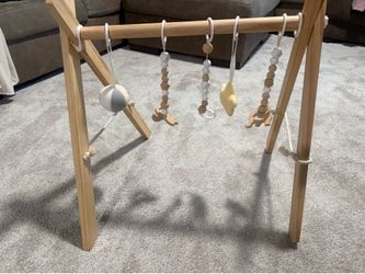 Wooden Baby Play Gym / Montessori Activity Gym  ✨ Wooden baby play gym in excellent condition. Stylish minimalist design with hanging sensory toys for