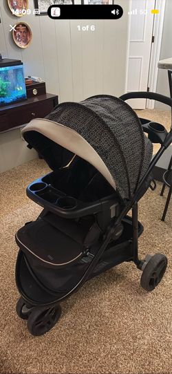 Graco Modes stroller featuring a reversible seat and a child's tray with cup holders