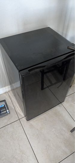 Mini fridge with three shelves