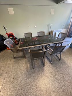 Brown Jordan table with 6 chairs