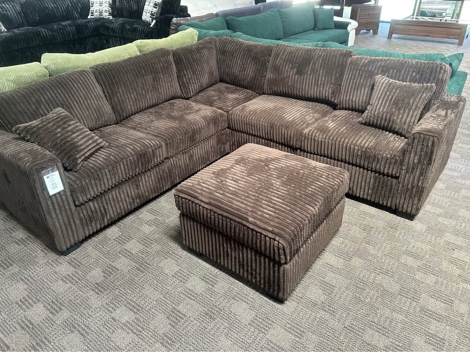 Chocolate brown sectional w/ ottoman