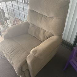 Tan recliner, electric leg lift, good condition