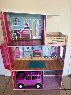 4ft. Wood Barbie house with elevator & Barbie car/SUV