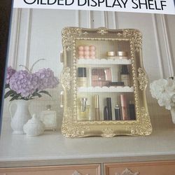 Gold display shelf