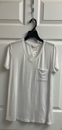 Brand new white pocket tee size M Juniors
