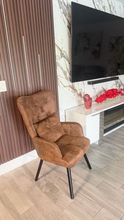 Brown Tufted Accent Chair with Black Legs