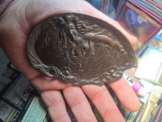 Beautiful metal (copper? Bronze?) Art woman in wind/water like a mermaid 🧜‍♂️ ✨️ 🧜‍♀️