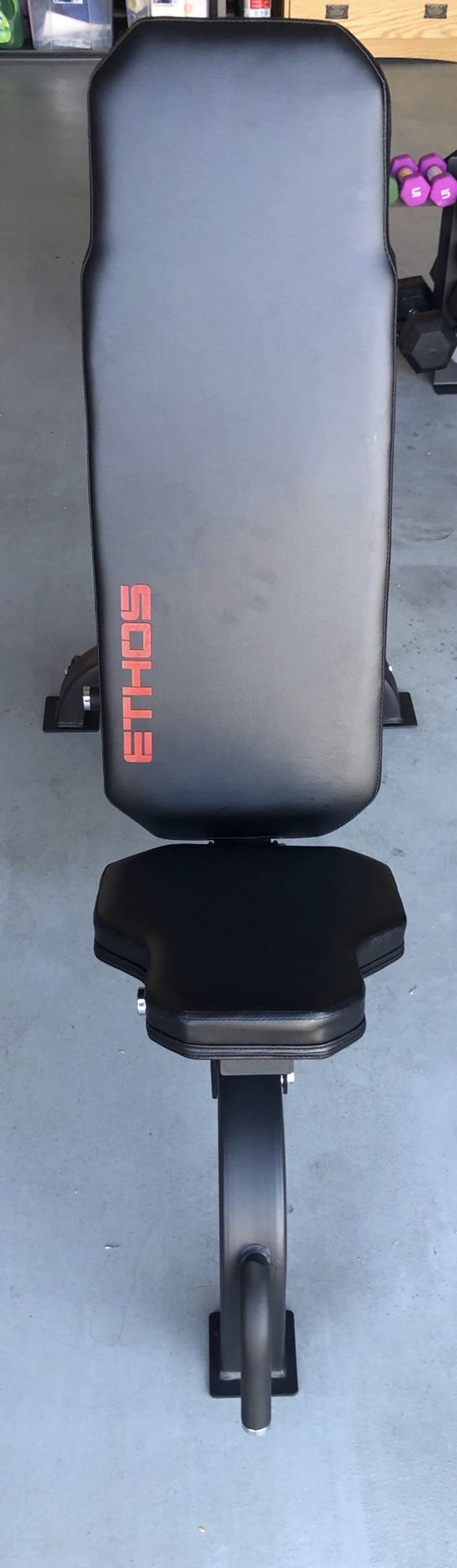 Ethos adjustable utility bench! Olympic weight bench, perfect for any