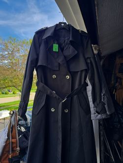 Woman's black trench coat