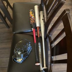 Baseball Bats And A Glove 