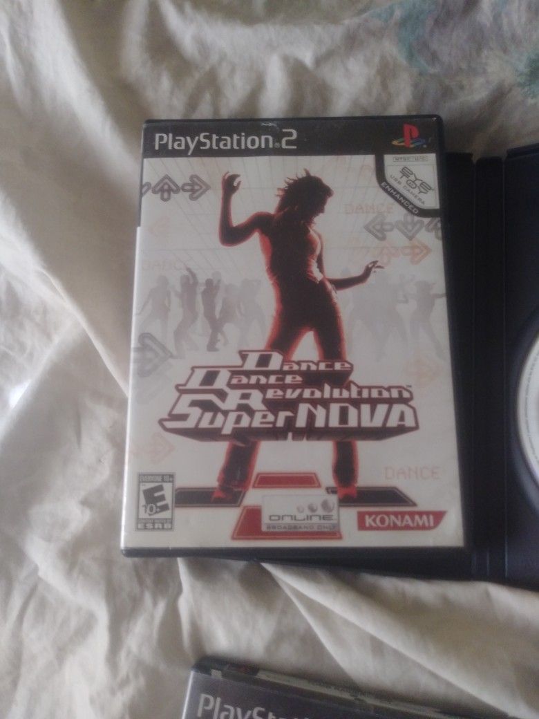 Ps2 With 5 Remotes And Games