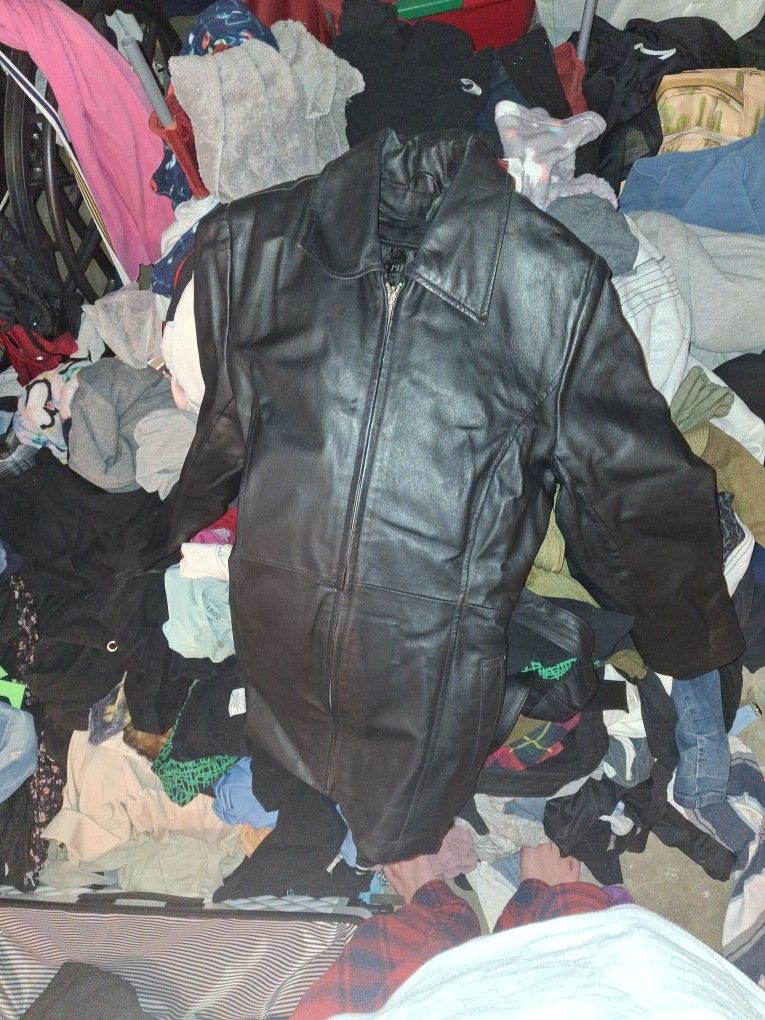 80$ Oscar Piel, Small Leather Jacket.