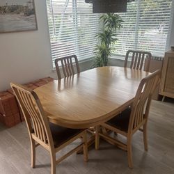 Dining Table + 4 Chairs – $200 (Total)