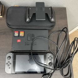 Nintendo switch +games/SD card + mic