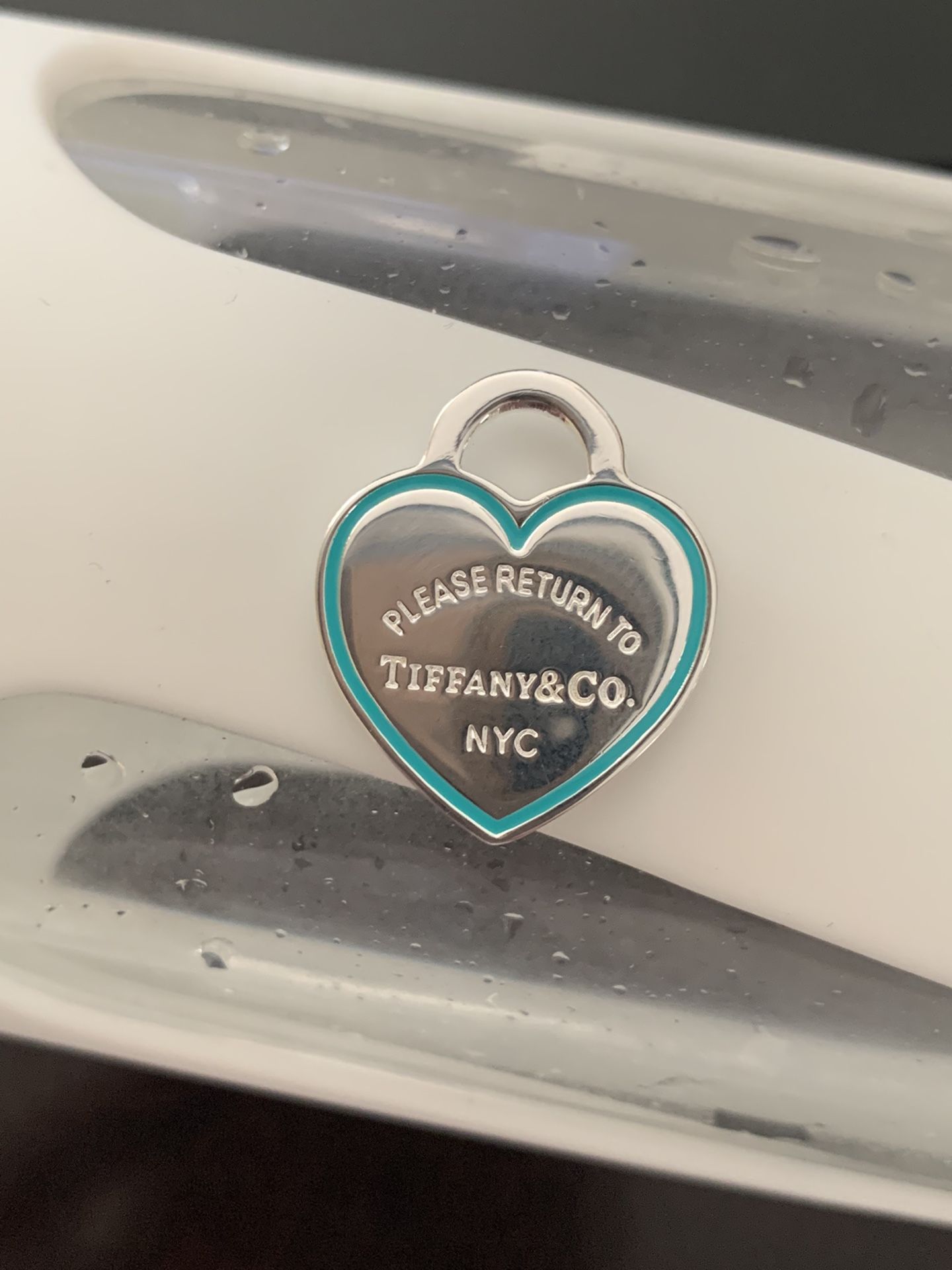 Tiffany & Co. heart with enamel blue outline charm/pendant