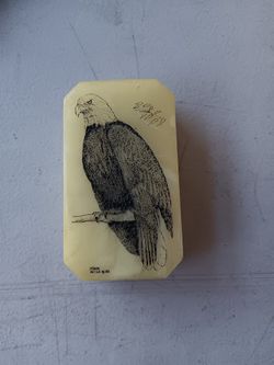 the olivenhain company Etched in marble Eagle.