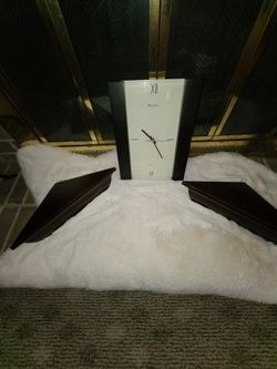 2 Corner Units/shelves  and Wall clock. Creates A  Lovely Look