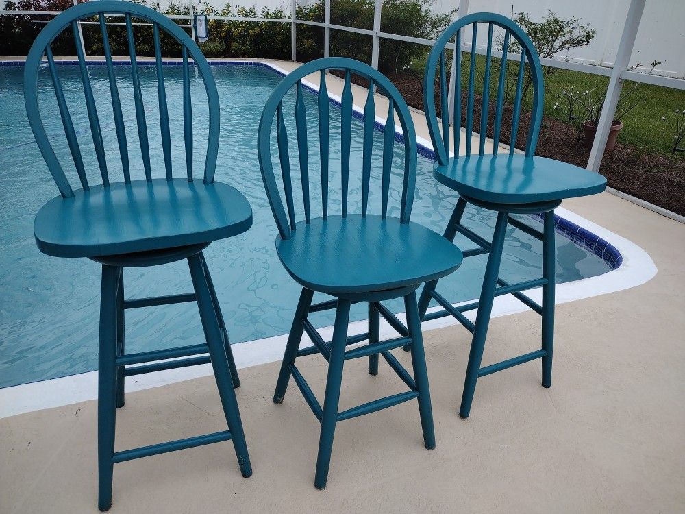Three Wood Swivel Bar Stools