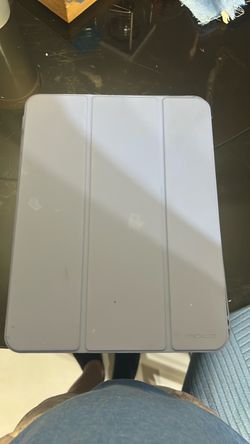 iPadOS 26.3.1 purple case with stickers