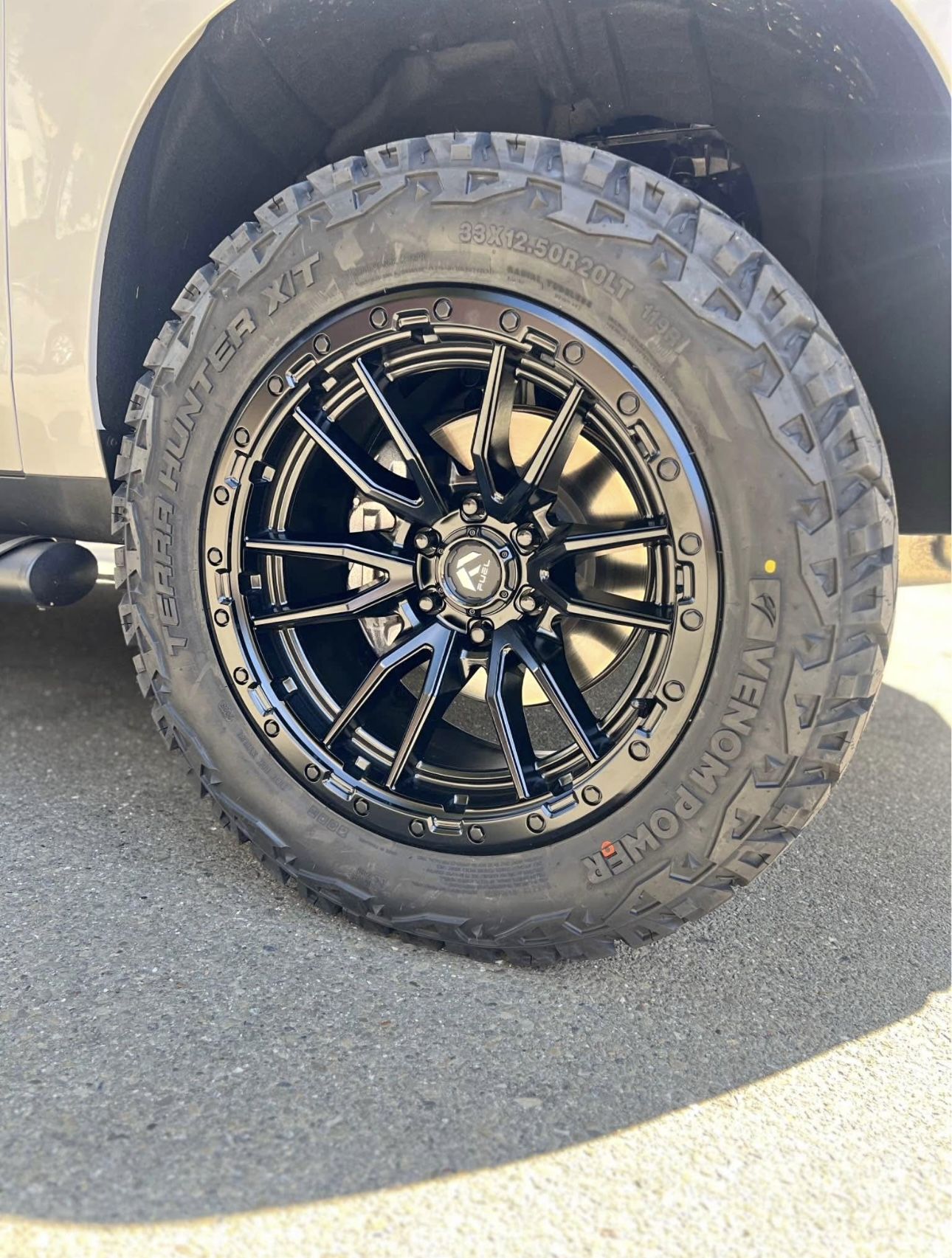 Fuel Rebel Matte Black 20" Wheels 33" Venom XT Tires Package Deal, WE FINANCE